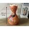This shows the size of the natural gourd vase. It is 13.75 inches tall and 8 inches wide. The gourd vase decorated a vintage green table.